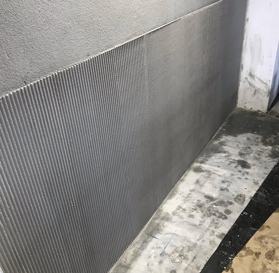 6mm vertical notch render façade at Burleigh Pavilion